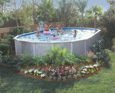 Landscaping around above ground pool! Beautiful Oval Pool, Landscaping Around House, Cheap Pool, Tattoo Plant, Swimming Pool Landscaping, Above Ground Pool Ideas, Ground Pool Ideas, Pool Landscape Design, Above Ground Pool Landscaping