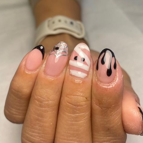 I’m obsessed with the Halloween nails right now 👻 India’s nail art is just the CUTEST!! She makes spooky chic. #nails #halloweennails… | Instagram Fall Or Halloween Nails, Cute Halloween Nails Short Almond, Spooky Season Nails Short Almond, Cute Nails For Halloween Short, Discreet Halloween Nails, Black Nails Halloween Art Designs, Cute Almond Halloween Nails, Very Short Halloween Nails, Scream Nails Acrylic Short