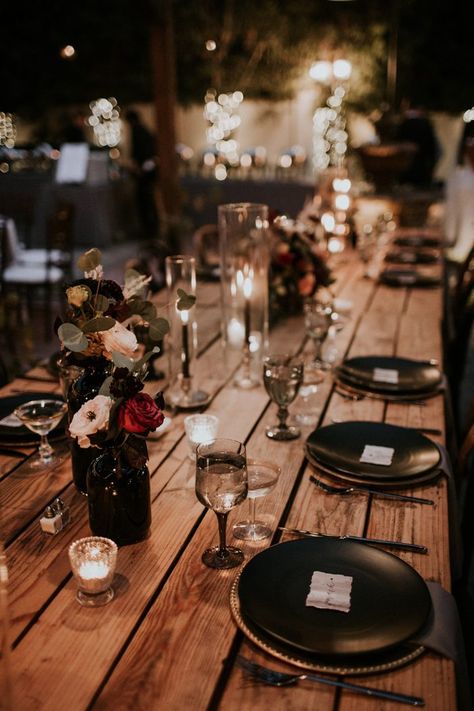 With black decor + bronze accents, the rich colors at this moody table were totally stunning | Image by Jami Laree Moody Romantic Wedding Decor Table, Moody Wedding Reception Table, Moody Romantic Wedding Centerpieces, Black Simple Wedding Decor, Glam Goth Wedding, Simple Moody Wedding Centerpieces, Black Bohemian Wedding, Black And Copper Wedding Table Settings, Dark Moody Wedding Table Decor