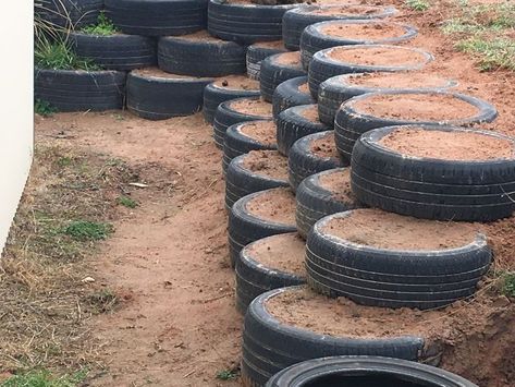 Retaining Wall Using Old Tires, Tyre Retaining Wall, Tire Retaining Wall Ideas, Tire Retaining Wall, Tyre Walls, Railroad Tie Retaining Wall, Tire Wall, Old Tyres, Retaining Wall Ideas