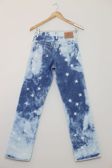 One-of-a-kind vintage Levi's 717 jeans with handmade customization - American stars pattern! Rare Levi's 717-0917 jeans from the 80s were reworked into an even more unique pair of jeans with an American star pattern. The jeans feature mid rise, zip fly closure and wide legs. This beautiful mid-blue color denim was bleached and painted with white stars. Sewing Stars On Jeans, High Rise Denim Blue Jeans With Star Print, High Waist Denim Jeans With Star Print, Blue Denim Jeans With Star Patch, Denim Blue Star Print Jeans, Vintage Levis Jeans, Vintage Levis, Levis Jeans, Star Patterns