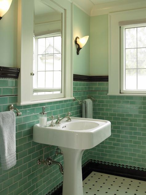 Classic vintage style can transform a bathroom into a little jewel box. The height of this tile, coupled with the natural light, reflects and shines; the black and white tile accents give it fun apothecary appeal. Classic Bathroom Tile, Traditional Powder Room, Vintage Tegel, Vintage Medicine Cabinets, Green Tile Bathroom, Craftsman Bathroom, Deco Bathroom, Retro Bathrooms, Room Tiles