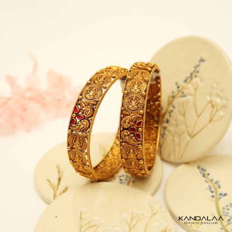 Adorn your wrist with the charm of yesteryears—these antique Nakas bangles feature intricate designs that blend historical artistry with classic sophistication. Bangles Jewelry Designs Gold Antique, Antique Bangles, Antique Gold Bangles Design, Classic Bangles, Gold Bangles Design, Bangles Jewelry Designs, Bangle Designs, Gold Jewellery Design, Bangles Jewelry