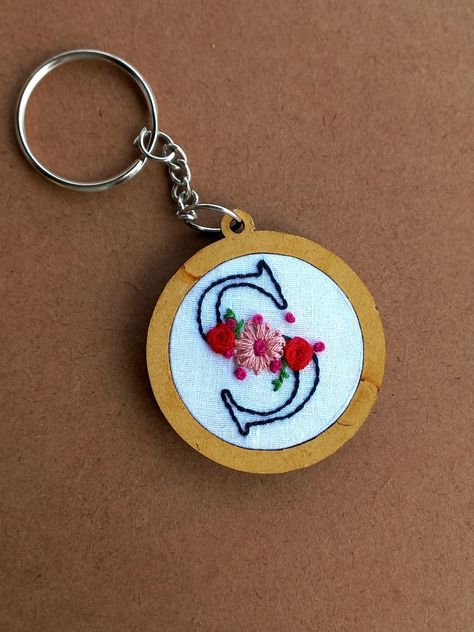 Hand embroidery Name initial floral keychain available in stock Initial Keychain Diy, Hand Embroidery Keychain, Embroidery Keychain Patterns, Embroidery Keychain Diy, Hand Embroidery Names, Keychain Embroidery, Embroidery Jewellery, Embroidery Keychain, Tiny Embroidery