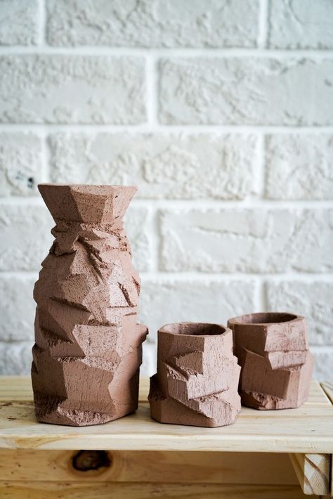 A Japanese style sake set made using the clay carving technique of kurinuki. These ceramic bottle and cups are hand carved from a single block of clay to give one of a kind unique pottery set. You visit Blank Earth Ceramics Kurinuki gallery for similar pottery designs. #homeware #japanesepottery #kurinuki #claycarving #ceramicbottle Clay Vases, Pottery Form, Sake Cup, Unique Pottery, Sake Set, Keramik Design, Ceramic Bottle, Slab Pottery, Hand Built Pottery