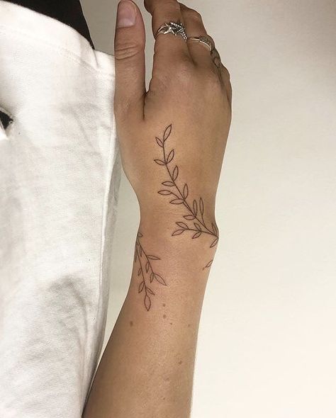 Wrap Around Wrist Vine Tattoo, Vines Around Wrist Tattoo, Wrap Wrist Tattoo, Wrist Vine Tattoos, Vine Wrapped Around Arm Tattoo, Olive Branch Tattoo Arm Wrap, Vine Wrist Tattoo, Wrist Wrap Tattoo, Aesthetic Tattoo Ideas