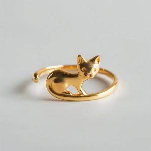 Embrace your love for feline elegance with YoPaCat's Cute Minimalist Golden Cat Ring. This charming ring features a sleek golden cat design, complete with a playful tail that wraps gracefully around your finger. Crafted with simplicity and style in mind, this piece is perfect for cat lovers who appreciate understated beauty. Whether you're dressing up for a special occasion or adding a touch... Cat Rings, Golden Cat, Cat Ring, Metal Work, Cat Design, Metal Working, Feline, Cat Lovers, Special Occasion