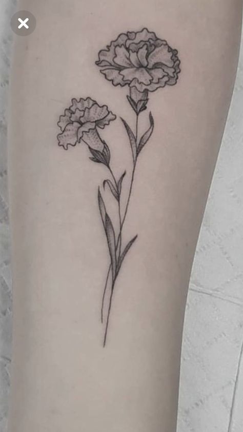 205+ Adorable Marigold Tattoos Ideas (2023) - TattoosBoyGirl Hadestown Flower Tattoo, Carnation Hip Tattoo, Carnation Flower Tattoo Arm, Simple Carnation Tattoo, Carnation Tattoo Design, Hadestown Tattoo, Marigold Tattoos, Carnation Flower Tattoo, Nc Tattoo