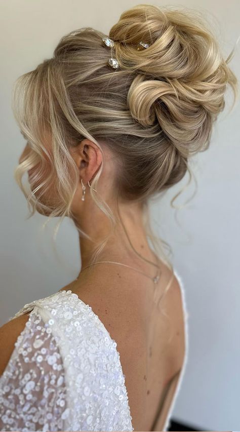 chic updo, hairstyle ideas, wedding hairstyle, wedding updo, updos, bridal hairstyle, bridal updos, messy updo, simple updo, messy upstyle, wedding hairstyle trends High Up Bridal Hair, Bride Updos For Long Hair With Veil, Wedding Updos For Round Faces, Wedding French Twist Updo, Races Hairstyles Fascinator, High Wedding Updo With Veil, Volume Updo Wedding, Wedding Hair High Updo, High Updo With Veil