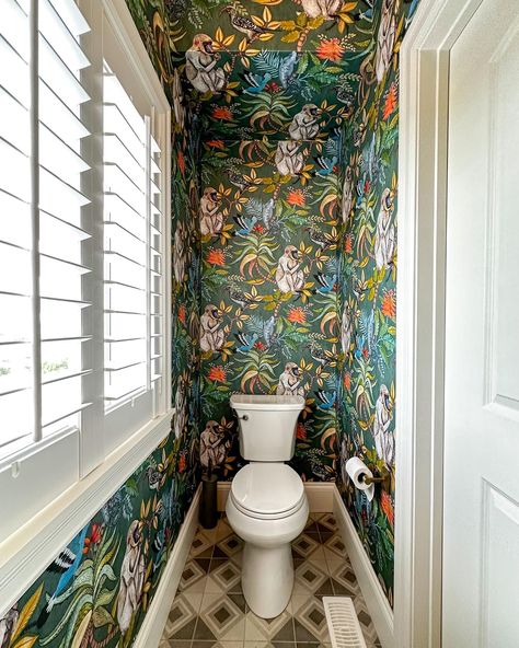 35 Powder Room Ideas for Stylish Homes - Inspire Your Space - placeideal.com Cool Powder Room Wallpaper, Wallpaper Powder Rooms Luxe, Whimsical Powder Room Wallpaper, Jungle Theme Powder Room, Small Powder Bathroom Ideas Wallpapers, Powder Room Tropical Wallpaper, Animal Wallpaper Powder Room, Funky Wallpaper Bathroom, Half Bath With Wallpaper