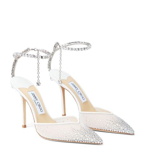 Find JIMMY CHOO Rhinestone-embellished Saeda Heels 100 on Editorialist. Adorned with a decadent crystal strap that rivals the sparkle of the finest jewellery, the Saeda pumps by Jimmy Choo are the epitome of bridal glamour. Crafted with a pointed toe cloaked in glitter, they boast a lavish, barely-there profile that works to elongate the leg when paired with sculptural evening gowns or tailored trousers. Due to the delicate nature of Jimmy Choo soles, shoes should be tried on a clean surface away from any moisture (e. g. a carpeted surface). All Jimmy Choo items must be returned in an unmarked, unused condition, including all original packaging, dust bag(s) and authenticity cards. Туфли Jimmy Choo, Jimmy Choo Heels Wedding, White Heels Expensive, Jimmy Choo Bridal Shoes, Bridal Shoe, Jimmy Choo Diamond Heels, Jimmy Choo White Heels, Jimmy Choo Bridal Shoes Sparkle, Jimmy Choo Sparkly Heels