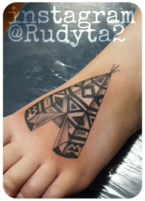 Teepee tattoo done on the foot. A small tattoo done in black ink. Artist Rudy Acosta captured the small details and smooth shading to make this one of the best teepee tattoos on Pinterest and instagram. Follow this artist on instagram @Rudyta2. #tattoo #tattoooftheday #tattoos #tattooed #inkedup #inked #clovisink #clovisinktattoo #cooltattoos #daily #femaletattoo #rudyacosta #rudy #rudytattoo Tee Pee Tattoo Native American, Teepee Tattoo, Indian Chief Tattoo, Religion Tattoo, Religion Tattoos, A Small Tattoo, Artwork Tattoo, Jewel Tattoo, Native American Tattoos