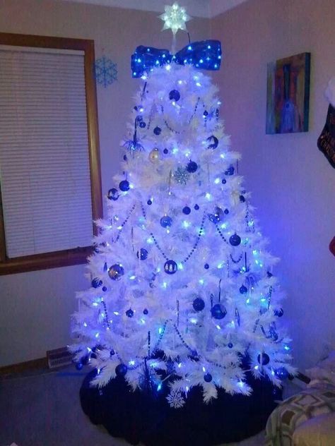 Blue Christmas White Christmas Tree With Blue Lights Decorating Ideas, White Christmas Tree With Blue Lights, White Christmas Tree Blue Ornaments, Light Blue Ornaments Christmas Tree, White Tree Blue Ornaments, White Tree Blue Lights, Blue Christmas Tree Decorations, White Christmas Tree Decorations, Flocked Christmas Trees Decorated