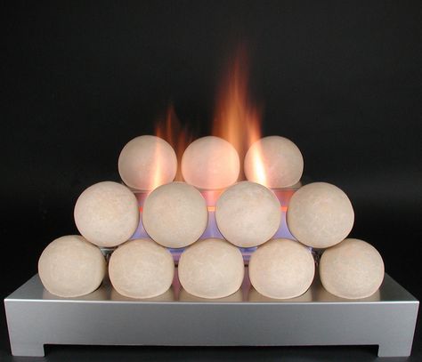 Not logs. Fire Pit Ball, Ventless Gas Fireplace, Ventless Gas Logs, Outdoor Fireplace Plans, High Heat Paint, Diy Outdoor Fireplace, Fireplace Update, Ventless Fireplace, Gas Log Sets