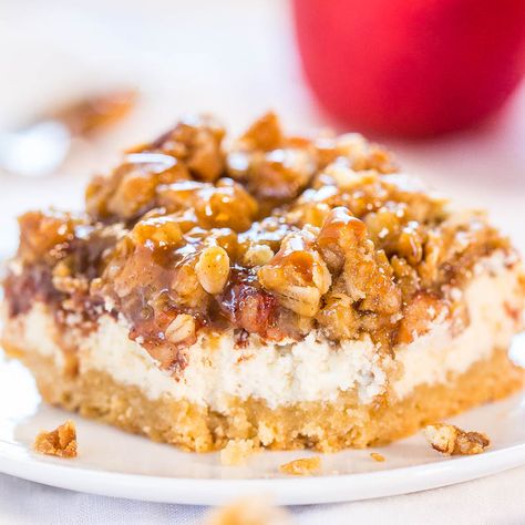 These caramel apple cheesecake bars feature a buttery crust that's topped with cheesecake and spiced apples, then drizzled with salted caramel sauce! Cheesecake Crumble Bars, Caramel Apple Crisp Cheesecake, Cheesecake Crumble, Crumble Cheesecake, Apple Crisp Cheesecake, Apple Cheesecake Bars, Sweet Bars, Caramel Apple Cheesecake Bars, Caramel Apple Bars