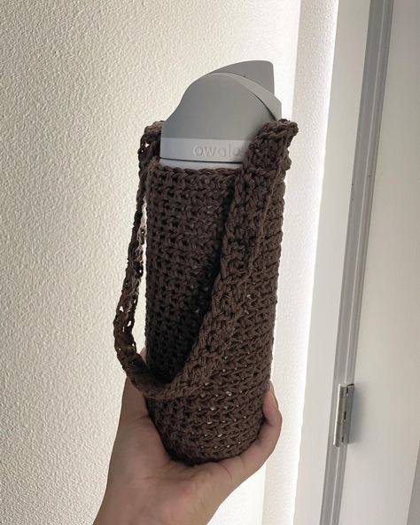 Cotton, durable, size varies depending on how big ur water bottle is!! Color is also customizable! Rope Water Bottle Holder, Crochet Projects Water Bottle Holder, Cute Crochet Water Bottle Holder, Crochet Big Water Bottle Holder, Crochet Bottle Holder Aesthetic, Crochet Water Bottle Holder, Water Bottle Holders, Bottle Holders, Bucket Bag