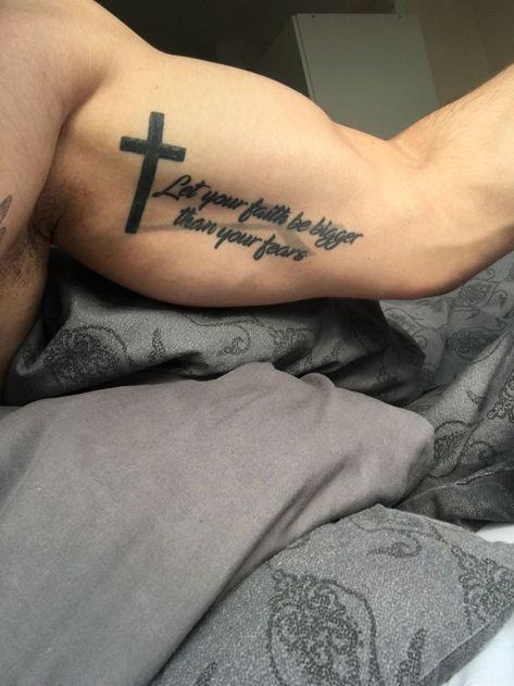 Tattoo Designs To Go Around Words, Tattoos For Self Improvement, Tattoo Ideas For Men Biblical, Tattoo Meanings For Men, Cross With Bible Verse Tattoo For Men, Mens Religious Tattoos, Quotes For Men Tattoos, Men’s Tattoos With Meaning, Men Tattoo Bicep