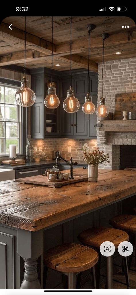 Black And Gold Rustic Kitchen, Brick Kitchen Dark Cabinets, Small Tudor Kitchen, Wood Stone Metal Interior Design, Stained Cabinets Painted Island, Black Stained Kitchen Island, Black Wood Cabinets, Leather Countertop, Styles Of Interior Design