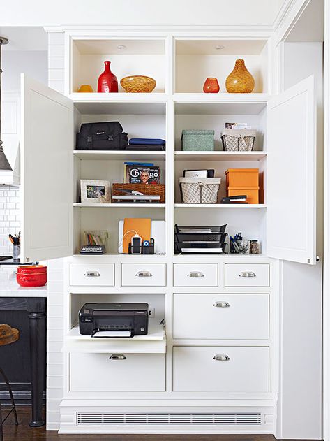 This storage-smart built-in is ideal for holding home office supplies. See the rest of this renovated home: http://www.bhg.com/home-improvement/remodeling/before-and-after/farmhouse-renovation/?socsrc=bhgpin051713builtinofficestorage=7 Wood Frame House, Ideas Closet, Office Built Ins, Farmhouse Renovation, Storage Closet, Kitchen Pantry Cabinets, Desk Areas, Cabinet Ideas, Home Office Storage