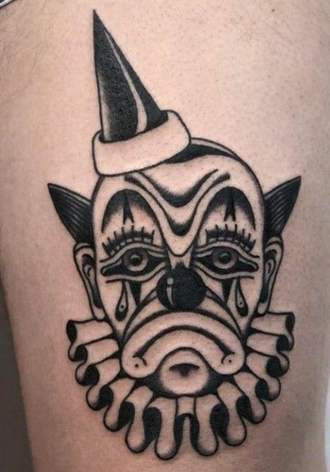 Traditional Tattoos Clown, Clown Tattoo Blackwork, Traditional Style Clown Tattoo, Trad Clown Tattoo, Bat Tattoo Leg, Happy Clown Tattoo, Scary Traditional Tattoo, American Traditional Clown Tattoo, Dark American Traditional Tattoo