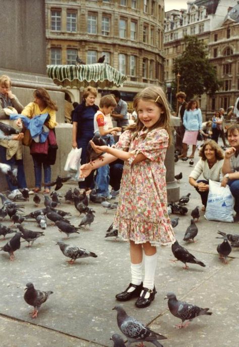 "Lucy feeding the pigeons in Trafalgar Square, 1981". New home for old photographs at the Bishopsgate Institute (London Family Photo Archive). Feeding Pigeons Photography, Healing Photos, Bird Woman, Pet Pigeon, Feeding Birds, London Family, Trafalgar Square, Brick Lane, Old Photographs