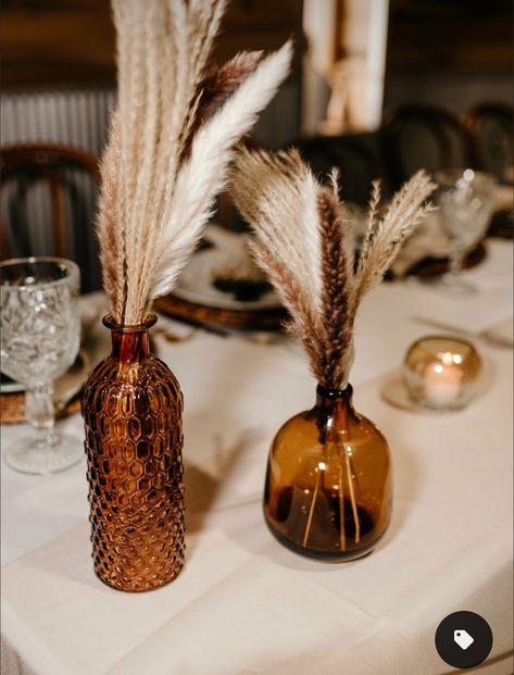 Copper Boho Wedding Decor, Boho Vases Wedding, Rust Boho Wedding Decor, Rust Orange Centerpiece, No Floral Centerpieces Wedding Ideas, Western Boho Table Decor, Fall Cocktail Table Centerpieces, Brown Vases Wedding, Amber Jars Wedding