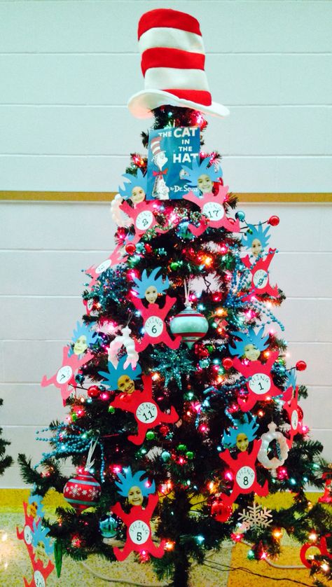 Storybook Forest Christmas Tree #DrSeuss #Catinthehat Storybook Christmas Tree, Dr Seuss Tree, Dr Seuss Christmas Tree, Themed Trees For Kids, Seuss Trees, Doctor Suess Christmas Tree, School Christmas Tree, Cat In The Hat Christmas Tree, Kids Christmas Tree Themes