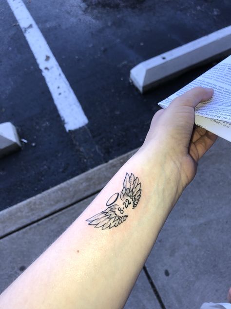 Wrist Angel Wing Tattoo, Angel Wings And Halo Tattoo, Angel Wings With Date Tattoo, Angel Halo Tattoo, Angel Wings Tattoo With Date, Angel Wing Wrist Tattoo, Small Wings Tattoo, Small Wing Tattoos, Wing Tattoos On Wrist