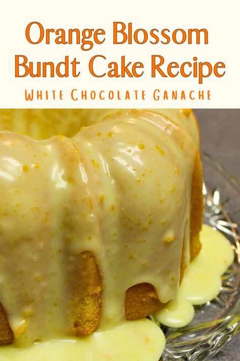 Close up view of an Orange Blossom Bundt cake on a glass dish with lots of White Chocolate Ganache drizzled over it Orange Blossom Balls, Orange Blossom Cake, Homemade White Chocolate, Pudding Cakes, Brunch Summer, Blossom Cake, Bundt Cake Recipe, Orange Cake Recipe, Mother's Day Brunch