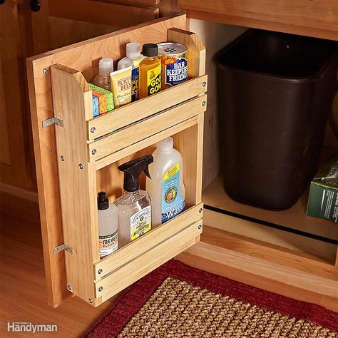 Here's a simple project to bring order to the chaos: a door-mounted storage rack. You can modify this basic idea to organize other cabinets too. A complete materials list and assembly diagram are available here Cabinet Door Storage Rack. Cabinet Door Storage, Cheap Kitchen Cabinets, Kitchen Storage Space, Kabinet Dapur, Inside Cabinets, Kitchen Cabinet Door, Diy Kitchen Storage, Cheap Kitchen, Sink Storage