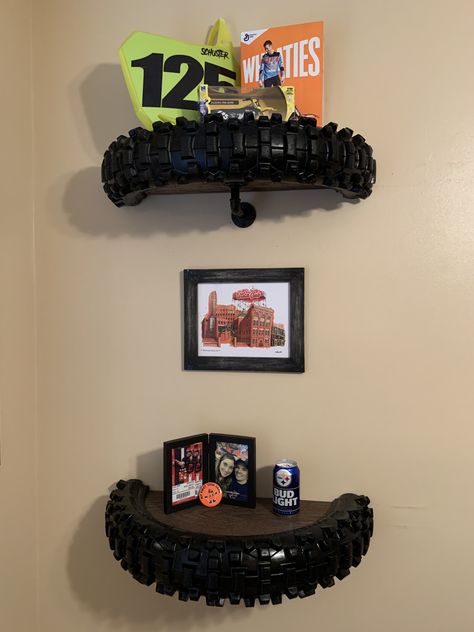 Turn old motorcycle tires into cool shelves for a man cave for child’s room! Moto Room Ideas, Motorcycle Room Aesthetic, Motorbike Theme Bedroom, Dirt Bike Themed Room, Auto Shop Decor, Dirt Bike Tire Shelf, Motorbike Bedroom Ideas, Motocross Themed Bedroom, Motorcross Bedroom Ideas