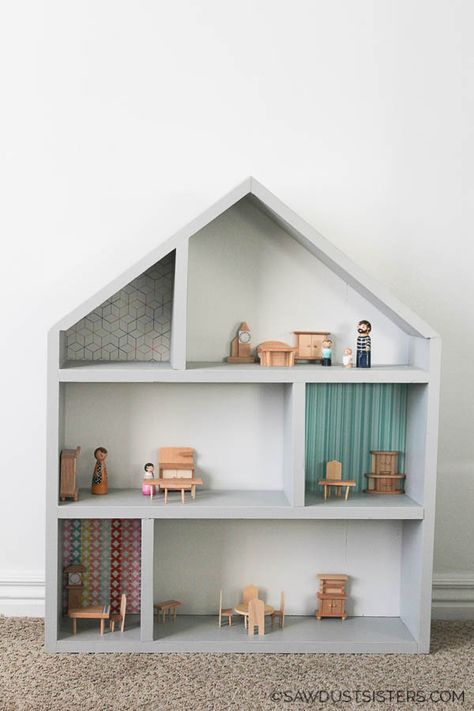 This simple DIY handmadewooden dollhouse makes a great gift. Build it with inexpensive lumber and a few tools. Click for a step-by-step tutorials and free plans. Dollhouse Furniture Plans, Log Furniture Plans, Diy Carpentry, House Crafts, Cute Furniture, Doll House Plans, Dollhouse Projects, Log Furniture, Wood Ideas