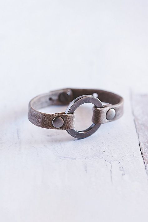 Designed to remind us that we all need to reconnect and ground to nature, our Grounding bracelet is handcrafted from the softest lamb leather and features a chunky antique silver ring with matching rivets. **Contents** * Lambskin leather, zinc alloy hardware * Button clasp closure * Handmade **Care/Import** * Made in the USA **Dimensions** * Adjustable to fit wrist sizes 6.5”-8” | Giving Bracelets Antique Silver Grounding Leather Bracelet at Free People in Grey Antique Silver Rings, Lambskin Leather, Rivets, Womens Jewelry Bracelets, Zinc Alloy, Antique Silver, Leather Bracelet, Silver Ring, Jewelry Accessories