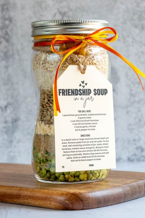 How to Make Friendship Soup Mix in a Jar Friendship Soup Mix In A Jar Recipe, Friendship Soup In A Jar Free Printable, Soups In A Jar Recipes Gift, Layered Soup Mix In A Jar, Homemade Christmas Gifts For Friends Mason Jars Soup Mixes, Muffin Mix In A Jar Gift, Soup Mix In A Jar Gift Recipes For, Soup Mix In A Jar Christmas, Jar Soup Mixes For Gifts