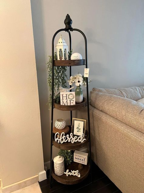 Tier Shelf Decor Living Rooms, 4 Tier Stand Decor, Home Decor Display Ideas, Standing Shelf Decor Living Room, Year Round Home Decor, Four Tier Shelf Decor, How To Decorate A 4 Tier Shelf, Corner Shelf Decor Living Room, Hobby Lobby Tiered Shelf Decor