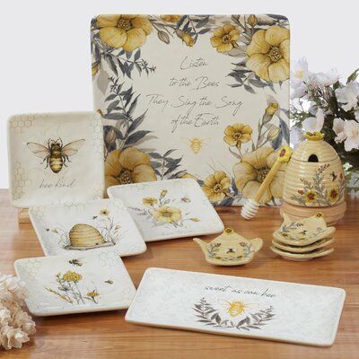 “Bee Sweet” is a charming ceramic dinnerware and serveware collection from Certified International. Designed by Susan Winget, it features busy bees and flowers along with sweet sentiments and a unique 3-d beehive teapot. | Certified International Bee Sweet Set / 4 Canape Plates, Asst. Ceramic / Earthenware / Stoneware in Yellow | Wayfair Tea Bag Plate, Bee Plates, Bee Sweet, Susan Winget, Appetizer Plates Set, Busy Bees, Food Storage Containers Organization, Ceramic Dinnerware, Appetizer Plates