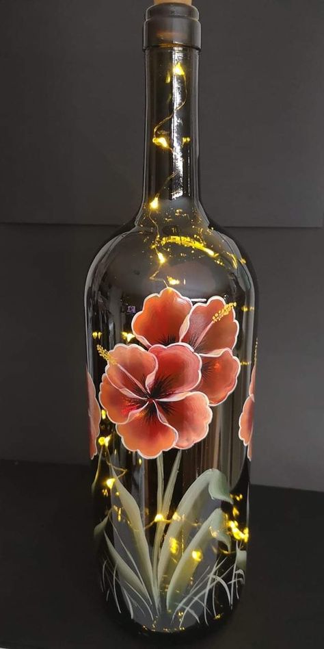 Painting Glass Windows Diy Ideas, Glass Color Painting On Bottle, Glass Bottle Painting Designs, Wine Bottle Painting Ideas, Bottle Art Flower Designs, Glass Bottle Painting With Lights, Flower Painting On Glass Bottles, Glass Painted Bottles Night Lights, Painted Glass Bottles