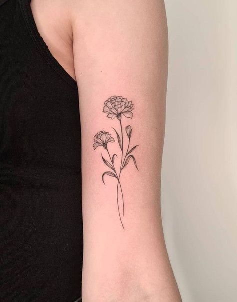 180+ Beautiful Birth Flower Tattoo Ideas (2023) - TattoosBoyGirl Carnation Tattoos, Lit Tattoos, Birth Flower Tattoo Ideas, Marigold Tattoo, Mum Tattoo, Carnation Tattoo, Flower Tattoo Ideas, Bouquet Tattoo, Petite Tattoos