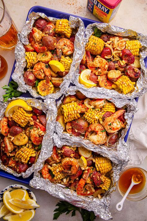 Easy Cajun Shrimp Boil Foil Packs (Oven or Grill!) Shrimp Boil In Oven, Easy Cajun Shrimp, Shrimp Boil Foil Packs, Cajun Shrimp Boil, Shrimp Grilled, Shrimp Boil Foil, Potatoes And Corn, Shrimp Corn, Shrimp Boil Recipe