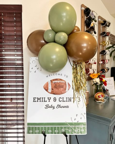 First Round Draft Pick Baby Shower 🏈 Custom balloon garland with Mylar, & party poofs in color palette: coffee, eucalyptus, & cream. Also seen here with our round top & spandex backdrop rental to bring together this football themed baby shower Superbowl Baby Shower Theme, Football Theme Baby Shower Ideas, Baby Shower Football Theme, Football Themed Baby Shower Ideas, Football Baby Shower Ideas, Football Baby Shower Theme, Backdrop Rental, Football Baby Shower, Football Couples