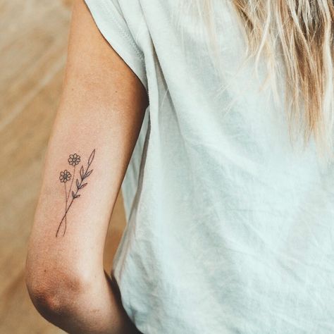 Wild Daisy Tattoo, Daisy Tattoo Meaning, Back Of Ankle Tattoo, Daisy Tattoos, Hairdresser Tattoos, Daisy Tattoo Designs, Daisy Flower Tattoos, Small Star Tattoos, Common Tattoos