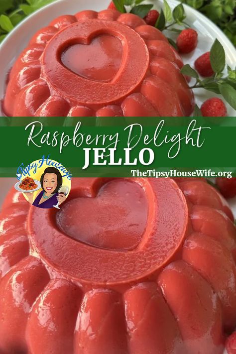 This photo shows a red raspberry jello mold with green leaves and berries around.
The brightly colored banner displays the name of the recipe, "Raspberry Delight Jello." Raspberry Jello Recipes, Ice Cream Raspberry, Jello Ice Cream, Raspberry Jello Salad, Jello With Cool Whip, Jello Deserts, Raspberry Sherbert, Raspberry Delight, Raspberry Recipes Dessert