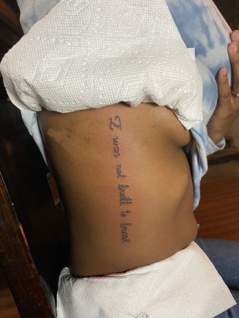 Words Down Side Tattoo, Side Word Tattoos Women, Baddie Tats Side Rib, Side Tattoos Women Ribs Meaningful, Side Tattoos Women Quotes, Nicki Minaj Tattoo, Side Tattoos Women Ribs, Hip Tattoo Quotes, Side Stomach Tattoos