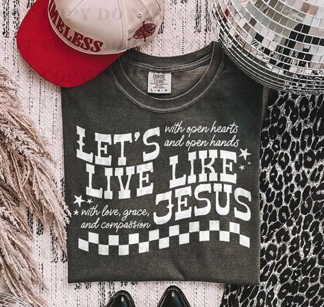 **Sunday Vibes | All About Jesus 🙏** It’s Sunday, so you know it’s all about faith, love, and Jesus! ✨ Rock your favorite **Faith Tee** today and let His light shine through you. 🌟 Wear your faith proudly. 🙌 #SundayBlessings #FaithTee #JesusFirst #SundayStyle Girly Shirts, Western Tees, Mom Fits, Shop Small Business Quotes, Christ Shirts, Graphic Shirt Design, Cricket Ideas, Fun Shirts, Western Tee