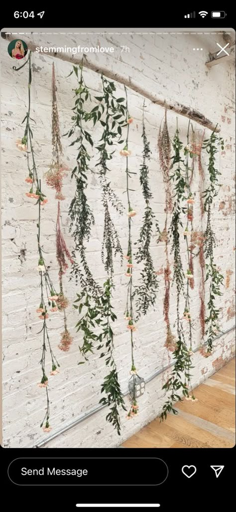 Hanging Greenery Backdrop, Boho Themed Wedding Shower Ideas, Wildflower Gender Reveal Ideas, Wildflower Backdrop Wedding, Diy Wildflower Party Decor, Wildflower Party Backdrop, Baby In Bloom Boho Shower Ideas, Baby Shower Flower Backdrop, Flowery Birthday Party Ideas