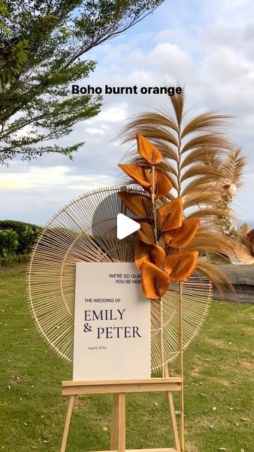 Giant Flowers Australia - Event Styling on Instagram: "Crafting this boho burnt orange wedding ceremony with giant flowers! 🍊the cliff top wedding location @wonderlanduluwatu adds even more magic!🪄 

Exciting news - we now offer our wedding decorations in Bali, in addition to Australia.
📲Explore our “Bali Weddings” LINK IN BIO 🔗page to see our range, prices and start planning your unforgettable celebration.❤️❤️
.
.
.
.
# #giantflowers #viralvideos #viralreels #florist #flowers #weddingideas #weddinginspiration #baliflowers #baliwedding #weddingdestination #romanticwedding #diy #crafts #decor #weddingdress #bride" Pampas And Burnt Orange Wedding, Burnt Orange Pampas Wedding, Burnt Orange Boho Bouquet, Burnt Orange Weddings Decorations, Burnt Orange Dried Flowers, Orange Flower Crown Wedding, Orange Wedding Decorations, Flowers Australia, Burnt Orange Weddings