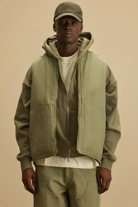 Available In Olive. 2 Front Pockets Front Button Closure Pair With "Alexander Utility Chore Jacket" Pair With "Alexander Utility Zip Work Jacket" Pair With " Alexander Utility Hooded Jacket" Pair With " Alexander Utility Overalls" Pair With "Alexander Double Knee Utility Pants" Pair With "Landon Stacked Skinny Flare Cargo Pants" Self: 100% Cotton Lining: 100% Polyester Padding: 100% Polyester Imported | Mens Alexander Utility Canvas Vest in Olive Green size 2XL by Fashion Nova Utility Vest Outfit Streetwear, Utility Vest Outfit, Utility Overalls, Flare Cargo Pants, Olive Green Outfit, Canvas Vest, Cargo Vest, Outfit Streetwear, Utility Vest