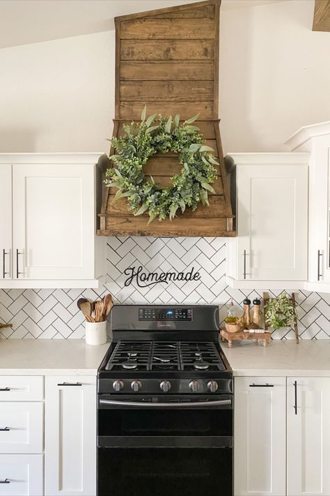 This is a picture of a kitchen with a wood vent hood that my husband and I DIY good in our newly remodeled kitchen. It's tall and goes all the way to the ceiling using a dark walnut stain. Diy Kitchen Hood, Wood Hood Vent, Hood Vent Cover, Range Hood Cover, Kitchen Vent Hood, Oven Hood, Hood Ideas, Kitchen Vent, Kitchen Hood