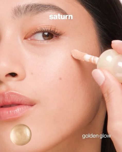 Sunnies Face on Instagram: "create an ethereal soft-focus glow: 𝗚𝗹𝗼𝘄 𝗢𝗻 💫

a light-catching liquid luminizer infused with skincare actives that nourish your skin while delivering a soft-focus glow

swipe to see all three celestial shades of 𝗚𝗹𝗼𝘄 𝗢𝗻 →
💫 𝘀𝘁𝗲𝗹𝗹𝗮𝗿 pearly champagne
💫 𝘀𝗮𝘁𝘂𝗿𝗻  golden glow
💫 𝗺𝗼𝗼𝗻𝗱𝘂𝘀𝘁 pink quartz

𝗚𝗹𝗼𝘄 𝗢𝗻
a light-catching liquid luminizer
now available everywhere online and in-stores" Liquid Luminizer, Sunnies Face, Moon Dust, Luminizer, Golden Glow, Soft Focus, Pink Quartz, Sunnies, Champagne