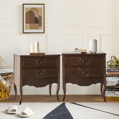 This set of two classic nightstands blends elegance and functionality, making it a great addition to your bedroom. Each piece features two visible drawers and a discreet hidden drawer, providing ample storage while maintaining a sleek appearance. The top drawer comes with a built-in charging station for convenient access to power your devices while keeping them organized. These tables are made from engineered wood, and they showcase high cabriole legs, wooden trim detail, and a curtained apron, Traditional Style Nightstand, French Nightstand, 3 Drawer Nightstand Vintage, 3 Drawer Nightstand Antique, 3 Drawer Antique Dresser, French Louis Xv Bedside Table, Wooden Trim, Nightstand With Charging Station, Walnut Side Tables